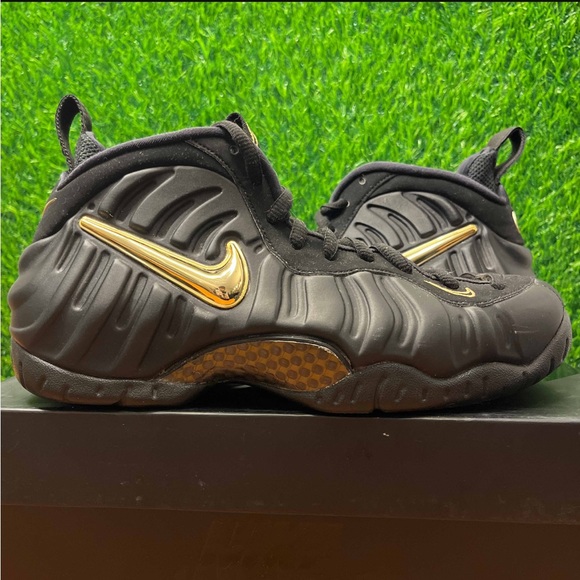 black and metallic gold foamposites